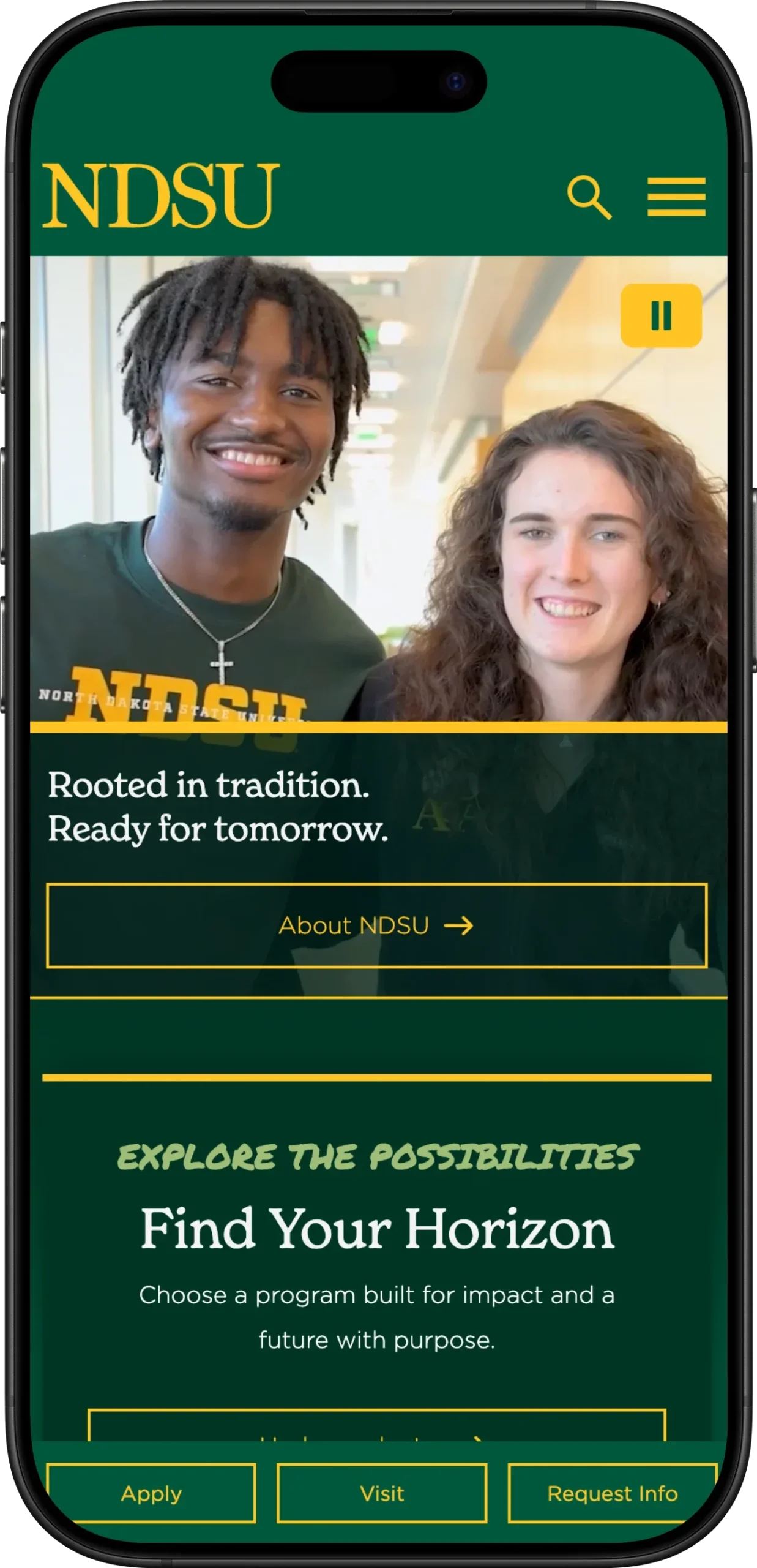 Screenshot of the NDSU website homepage displayed on an iPhone; the screenshot shows two students standing side-by-side with the text 'Rooted in Tradition. Ready for Tomorrow.' and a link titled 'About NDSU.'